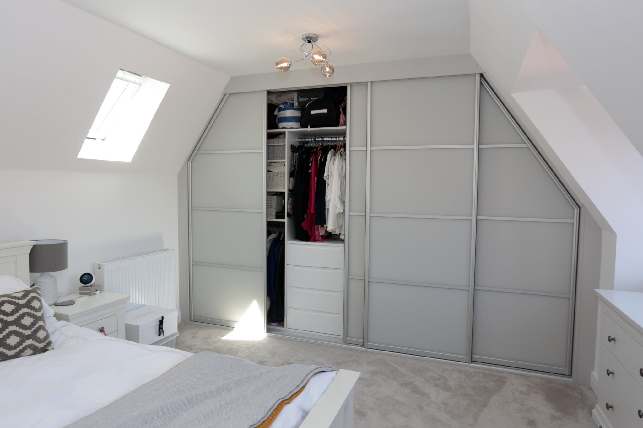 Angled sliding wardrobe interior drawers